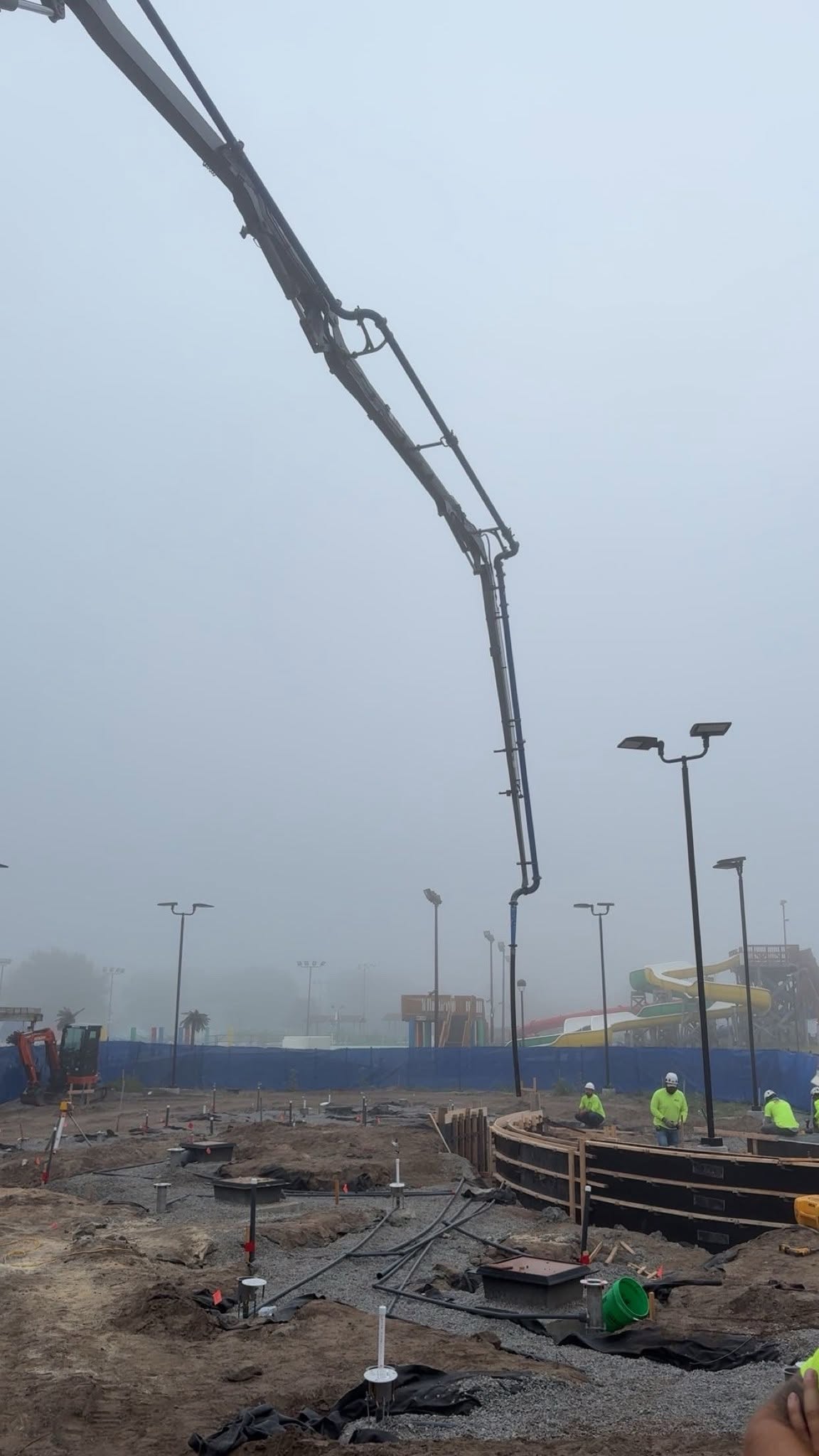 Concrete pump and Kort Concrete crew working on a large commercial pour