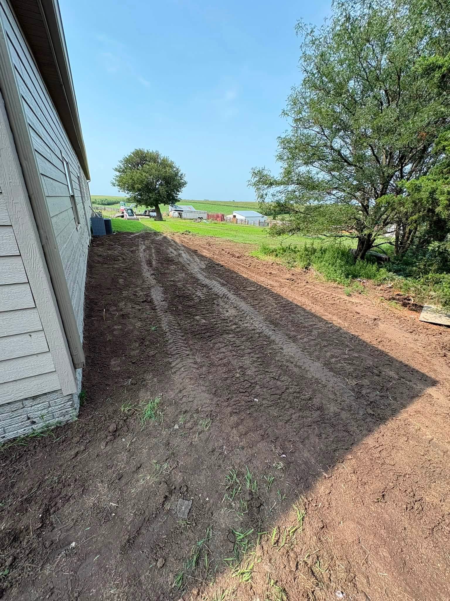 Residential foundation area graded and prepared for concrete work